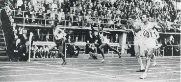  ??  ?? 0 Lindy Remigino wins the Mens 100 metres semi-final race at the 1952 Olympic Games in Helsinki