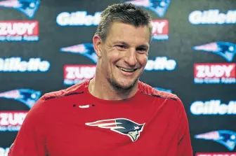  ?? MATT STONE / BOSTON HERALD ?? IN GOOD SPIRITS: Rob Gronkowski smiles as he meets the media yesterday at Gillette Stadium, where the Patriots tight end said he will be ready to return tomorrow against the New York Jets.