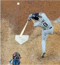  ?? DAVID J. PHILLIP THE ASSOCIATED PRESS ?? Tampa Bay’s Brandon Lowe hits a two-run homer off of Dodgers starter Dustin May during the fifth inning in Game 2 of the World Series in Arlington, Texas, on Wednesday night. The Rays won, 6-4, to even the best-of-seven series at one victory apiece.