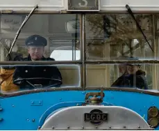  ??  ?? Jim Sloss spotted this driver of a vintage bus