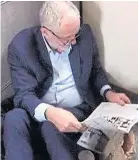  ??  ?? SHABBY: Corbyn sat on the floor