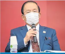  ?? — AFP ?? Toshiro Muto wears a face mask as he speaks during a press conference following a Tokyo 2020 Olympics Executive Board meeting in Tokyo. file photo