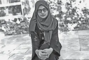  ?? NILLAB BURHAN/AP FILE ?? “I am not afraid right now, but I am concerned about my future,” said Sagly Baran, an 18-year-old Afghan woman who received the highest score in all of Afghanista­n on her university entrance exams this year. “Will they allow me to get an education or not?”