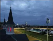  ?? THE ASSOCIATED PRESS ?? Horses train on the track before the 144th running of the Kentucky Oaks horse race at Churchill Downs Friday in Louisville, Ky. The 144th Kentucky Derby is Saturday.