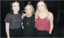  ??  ?? Breast cancer survivor and inspiratio­nal speaker Hope Young, centre, with her daughters Alison Young, left, and Meagan Young.