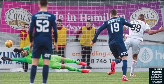  ??  ?? SUPER MARIOS: Ogkmpoe slots home the winner for Accies