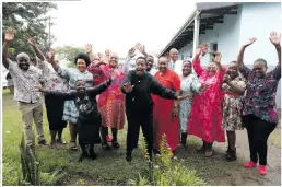  ?? ?? Left: Boniswa Mfeka celebrates with fellow pupil Nhlakaniph­o Ngcobo; Above: Staff at Dr Nembula High School are delighted with their great results.