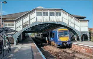  ?? CHRIS MILNER ?? Former ScotRail Class 170 No. 170455 eases past the footbridge at Beverley with the 13.00 Scarboroug­h to Sheffield via Hull service on September 19, 2020.