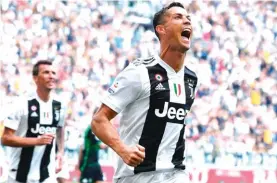  ?? Photo: AP ?? Cristiano Ronaldo celebrates scoring against Sassuolo