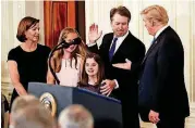  ?? [AP PHOTO] ?? President Donald Trump shakes hands with Judge Brett Kavanaugh, his Supreme Court nominee, in the East Room of the White House on Monday.