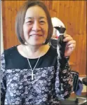  ??  ?? Oban’s Fumiko Miller has raised around £300 for charity by having her long hair cut off. Fumiko, who is originally from Tokyo, had the chop on Friday December 1 at Reflection­s in Oban to raise money for Mary’s Meals, where she is a volunteer. The 12...