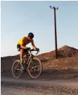  ?? ?? A gravel cyclist practises on a track in Ras Al Khaimah