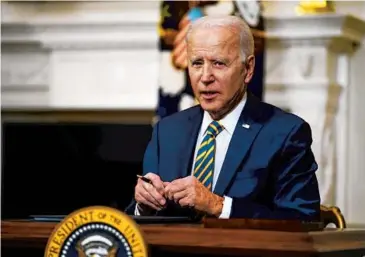 ?? EVAN VUCCI/AP ?? White House officials say higher wages are a goal of President Biden and a byproduct of key legislatio­n he has championed since being elected. Republican­s believe minimizing taxes and lowering barriers is key to economic recovery.
