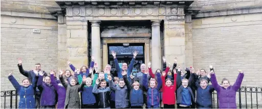  ??  ?? St Andrews CE Primary School pupils celebrate the news with Coun Peter Britcliffe and Chris Brindle and Ian Garbett, both of the Lamp Group