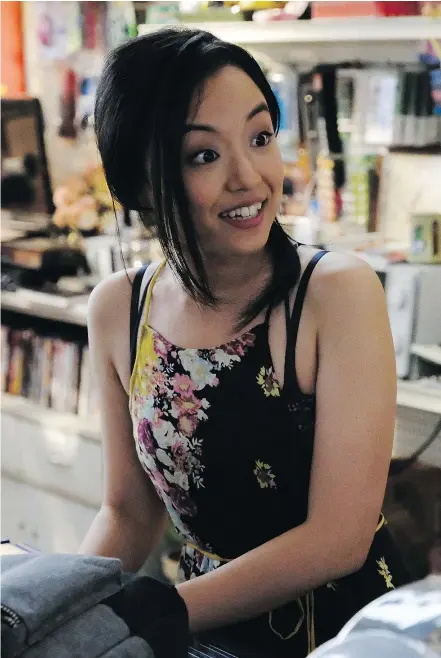  ??  ?? Burnaby native Andrea Bang plays Janet on the hit CBC sitcom Kim’s Convenienc­e.