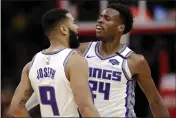  ?? NAM Y. HUH — THE ASSOCIATED PRESS ?? Sacramento Kings guard Cory Joseph, left, celebrates with guard Buddy Hield after scoring a basket during the second half Friday against the Chicago Bulls in Chicago.