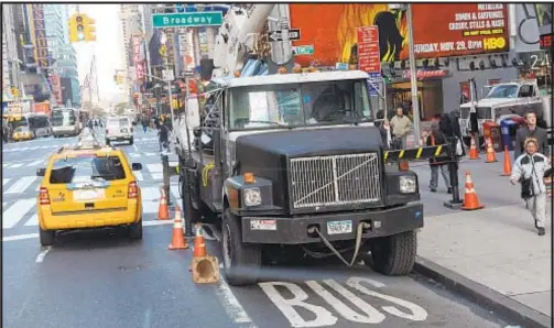  ??  ?? Utility trucks are among the prime offenders when it comes to blocking bus lanes. Now, Interim NYC Transit President Sarah Feinberg (below) is warning companies this will not be tolerated.