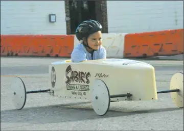  ?? ?? There’s no denying the fun of racing headlong down a hill, and lots of fun was had at this year’s Sheyenne Soap Box Derby on Saturday.