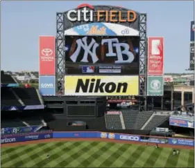  ?? FRANK FRANKLIN II — THE ASSOCIATED PRESS ?? The Rays players warm up at Citi Field before a game against the Yankees Monday in New York. The series was moved from St. Petersburg, Florida, because of Hurricane Irma.