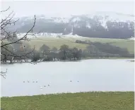  ??  ?? Burst banks The Tay spilled into fields at Logierait