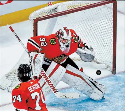  ?? CHRIS SWEDA / CHICAGO TRIBUNE ?? Blackhawks goaltender Kevin Lankinen makes a save against the Blue Jackets Feb. 11 at the United Center.