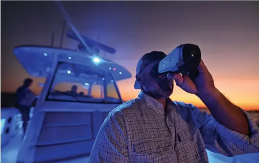  ??  ?? Turn night into day with the new Scion outdoor thermal monocle from FLIR. It can also be a lifesaver in a man-overboard situation.