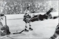  ?? Ray Lussier / Associated Press ?? The Bruins’ Bobby Orr is airborne after scoring the goal against the Blues that won the Stanley Cup for Boston in May 1970.