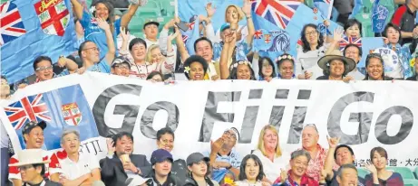  ?? Picture: JOVESA NAISUA ?? Friends, families and fans of the Flying Fijians team cheer for Fiji in the match against Wales at Oita Stadium in Oita, Japan, on Wednesday.