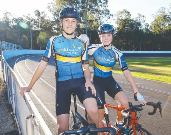  ?? Picture: TERTIUS PICKARD ?? Luke Richert, 14, and Maddison Smith, 12, prepare for state junior titles hosted by the Gold Coast Cycling Club this weekend.