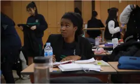  ??  ?? Simone studying at her high school in South Korea. Photograph: Dinky Pictures LLC