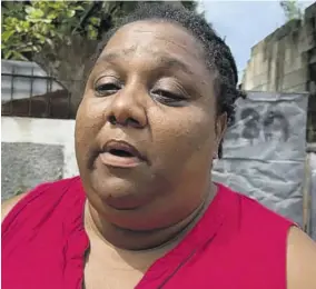 ?? ?? Cary Salmon speaking with the Jamaica Observer after her fiveyear-old daughter Denique was killed by a stray bullet as gangsters engaged in a firefight in Duhaney Park about 1:00 am yesterday.
