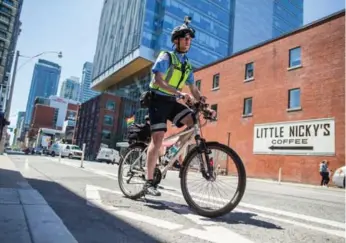  ?? JESSE WINTER/TORONTO STAR FILE PHOTO ?? Parking cop Kyle Ashley became a hero to Toronto cyclists with his fierce defence of bike lanes on Twitter.