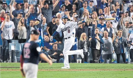  ?? KEVORK DJANSEZIAN GETTY IMAGES ?? Dodger Manny Machado’s premature bat flip in Game 3 of the World Series (he ended up with a single) joins a list of misadventu­res by the soon-to-be free agent.