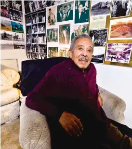  ?? ALISON GREEN/CHICAGO READER ?? Herman Roberts surrounded with some of the photos from his career as a nightclub, taxi and motel entreprene­ur.