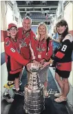  ?? SPECIAL TO THE NIAGARA FALLS REVIEW ?? Alex Luey, his father Scott, stepmother Mallory and mother, Catherine with the Stanley Cup.