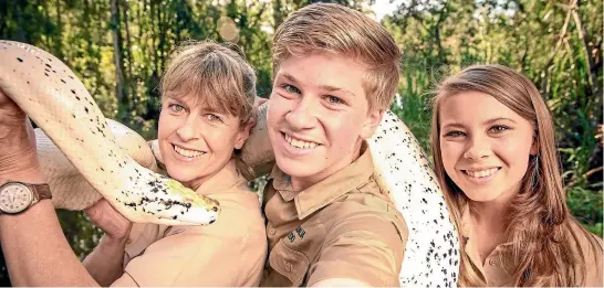  ??  ?? Steve Irwin’s legacy of mixing bold entertainm­ent and heart-on-sleeve presentati­on with an underlying message of conservati­on lives on through wife Terri, kids Robert and Bindi, in their new show Crikey! It’s the Irwins.