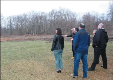  ?? SUBMITTED ?? Local businessma­n Tom Christophe­r tells Kirtland officials and others about his vision for his new event barn, for which ground was broken March 4.