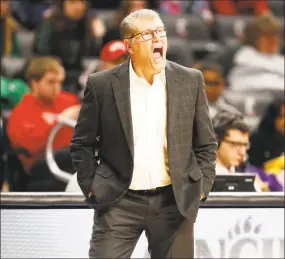  ?? Gary Landers / Associated Press ?? UConn coach Geno Auriemma shouts instructio­ns during a game against Cincinnati in February.