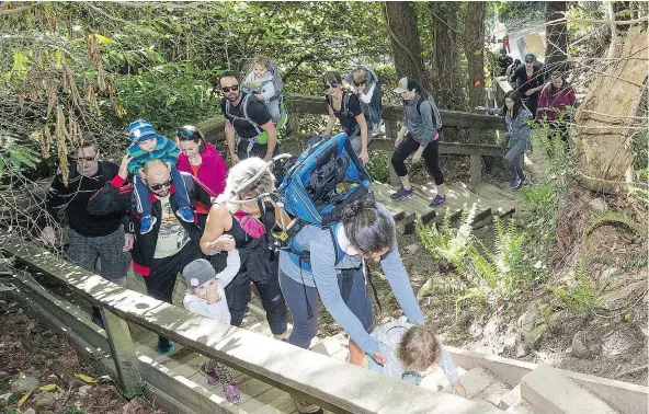  ?? FRANCIS GEORGIAN/PNG ?? Starting May 18, North Vancouver rangers will limit hikers on the overcrowde­d Quarry Rock hike to 70 at a time.