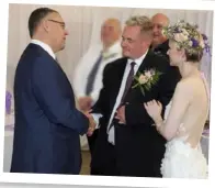  ??  ?? LEFT: The bride is walked down the aisle by friend Vivian Attwood. BELOW: The couple with their groomsmen and minister Alwyn Small of the Dutch Reformed Church. RIGHT: Nicolette and Rian cut the two-tier cake he and his mom baked for the occasion.