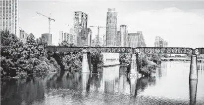  ?? Anna Donlan / Getty Images ?? Smartish’s “Kung Fu Grip” comes from a famous piece of graffiti adorning a railroad bridge over Lady Bird Lake in Austin.