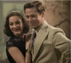  ?? DANIEL SMITH/PARAMOUNT PICTURES ?? Brad Pitt, with Marion Cotillard, plays a Canadian in the movie Allied, one of 150 U.S. films featured in
