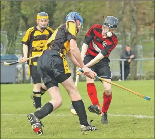  ?? Photograph: Kevin McGlynn. ?? Lochside’s Daniel Sloss has his shot blocked during the South Division One game against Col Glen at Mossfield last Saturday.