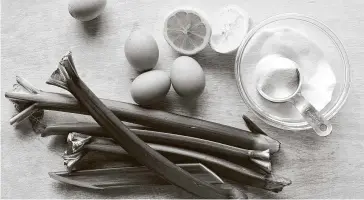  ?? Photos by David Malosh / New York Times ?? This season, consider turning rhubarb stalks into a lemon-barlike dessert that swaps tart rhubarb for citrus.