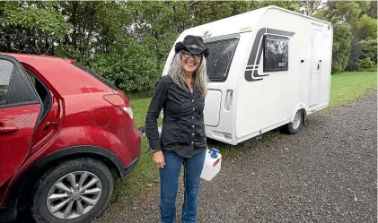  ??  ?? Helen Medlyn encounters a wee bit of trouble backing her caravan into a parking spot.