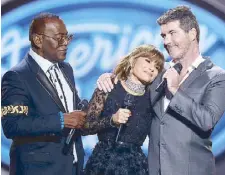  ?? —AP photo ?? American Idol original judges (from left) Randy Jackson, Paula Abdul and Simon Cowell