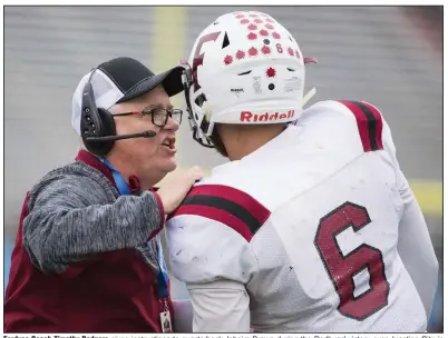  ?? (Democrat-Gazette file photo) ?? Fordyce Coach Timothy Rodgers gives instructio­ns to quarterbac­k Jaheim Brown during the Redbugs’ victory over Junction City in last season’s Class 2A championsh­ip game. The Redbugs are among the favorites to win the title again this season.