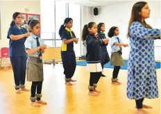  ?? Clint Egbert/Gulf News ?? ■ Sameeksha Joshi teaches Indian classical dance to students at the GEMS Heritage School in Dubai.