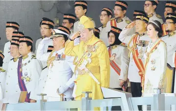  ??  ?? Sultan Sharafuddi­n, accompanie­d by Tengku Permaisuri Norashikin, during the opening ceremony of the first meeting of the sixth term of the 13th State Legislativ­e Assembly. — Bernama photo