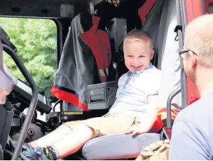  ??  ?? ●●Jackson Lewis, aged four, from Bramhall enjoyed the fire engine at the Independen­t Options event